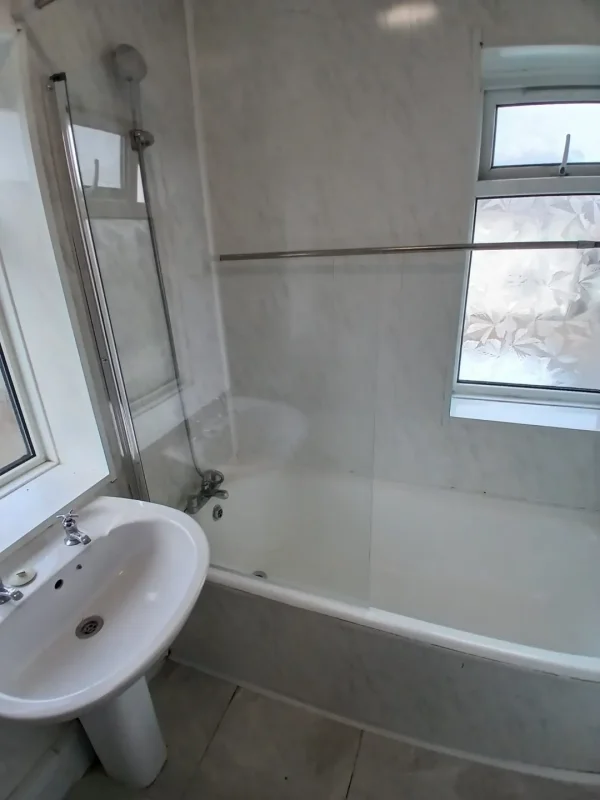 The refreshed bathroom with its new shower screen.
